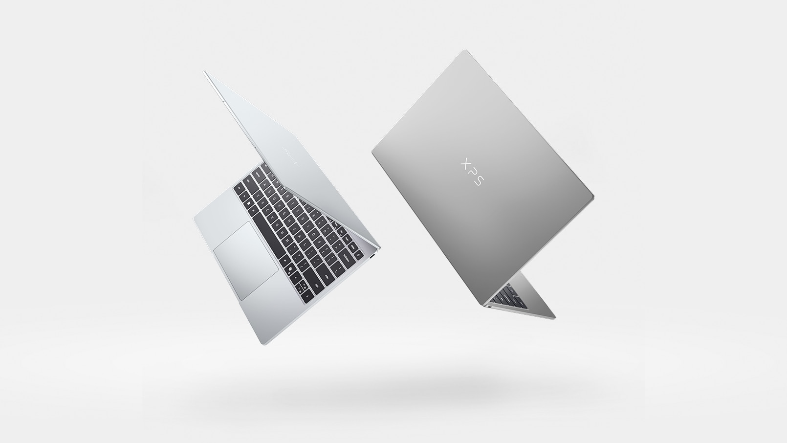 XPS 13 — machined aluminium chassis, studio lighting